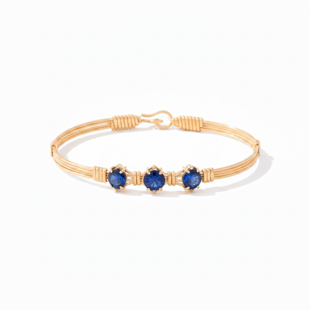 You Are My Sunshine Bracelet with round blue sapphire stones in 14k gold artist wire