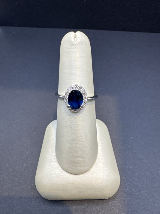1.46 Carat Oval Sapphire Ring with Diamond Halo — A Statement in Blue