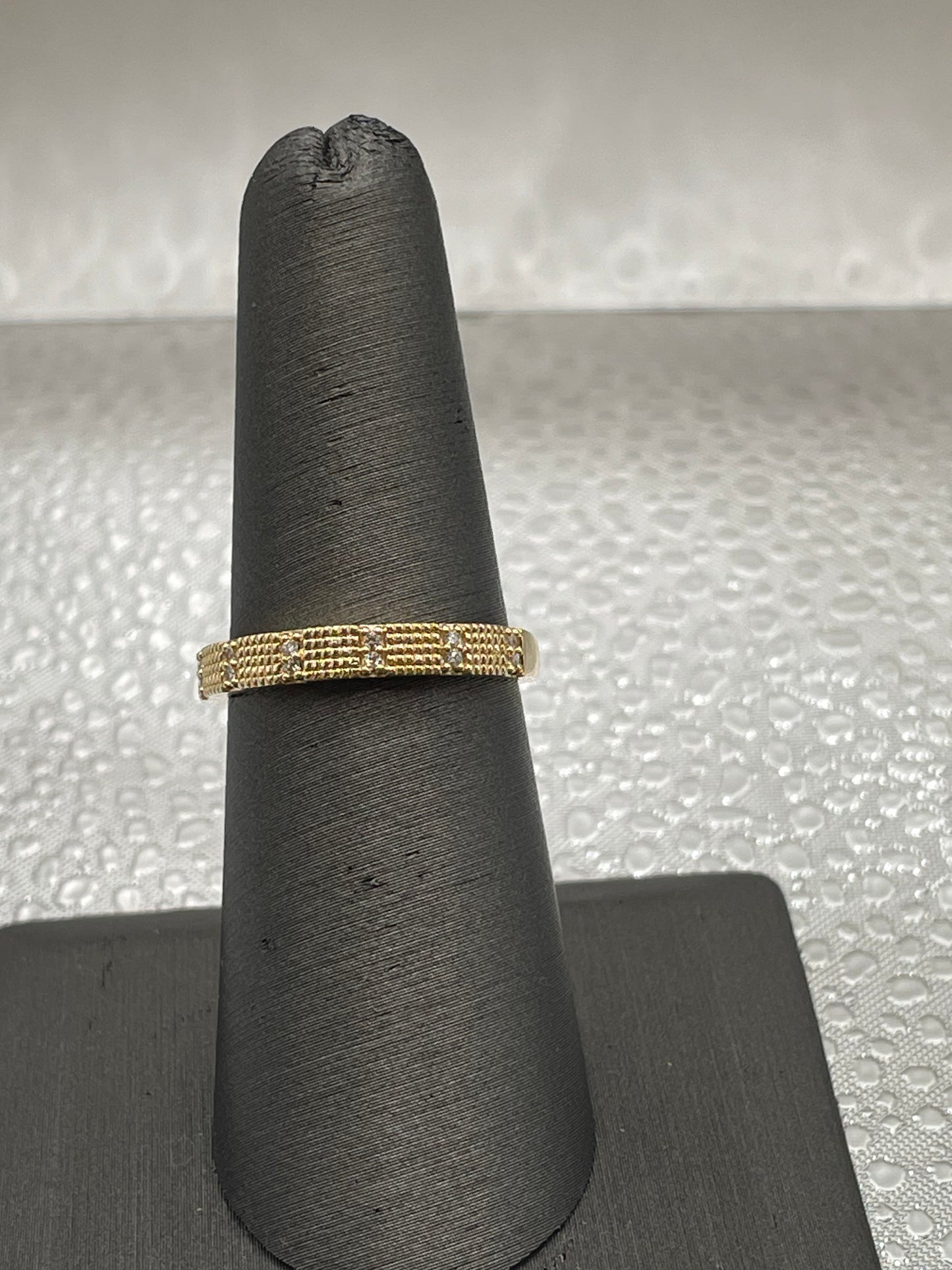 Diamond and textured Gold Band