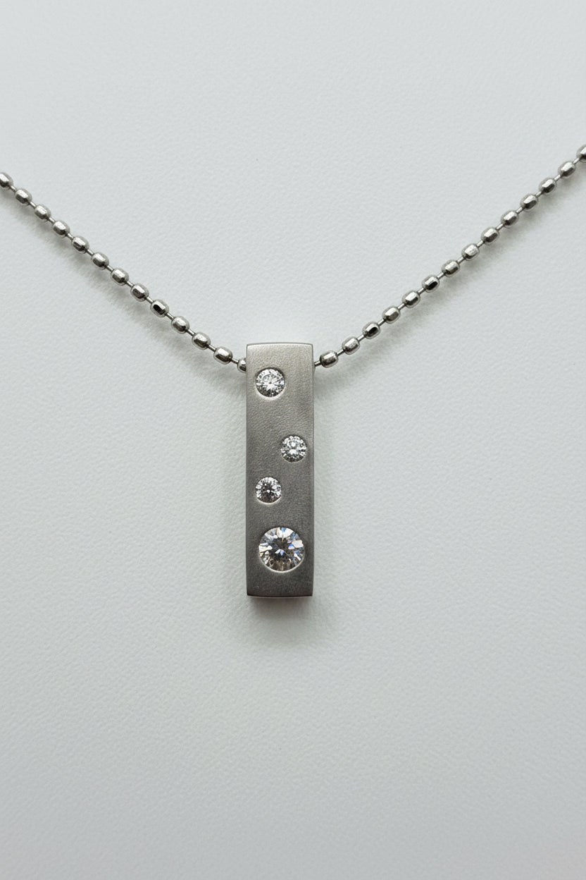 Platinum Diamond Bar Pendant Necklace – 1/10 CTTW