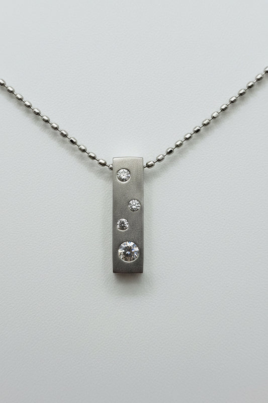 Platinum Diamond Bar Pendant Necklace – 1/10 CTTW
